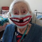 Grandma wearing mask with smiling design