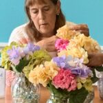 Grandma organizing the flower in the vase